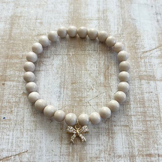 Riverstone & Gold Bow Charm